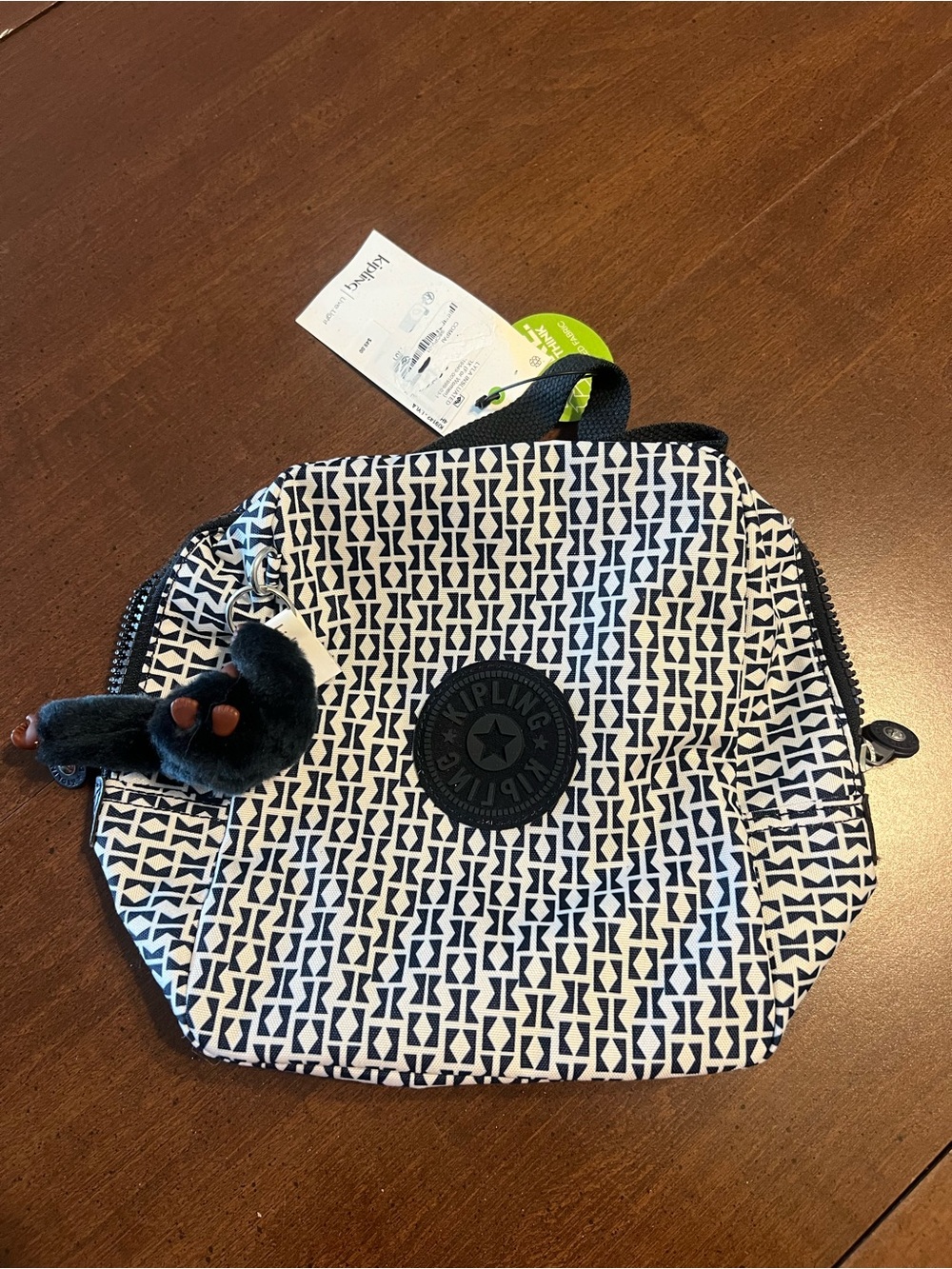 KIPLING | NAVY AND WHITE PATTERNED SMALL POUCH WITH MONKEY KEYCHAIN